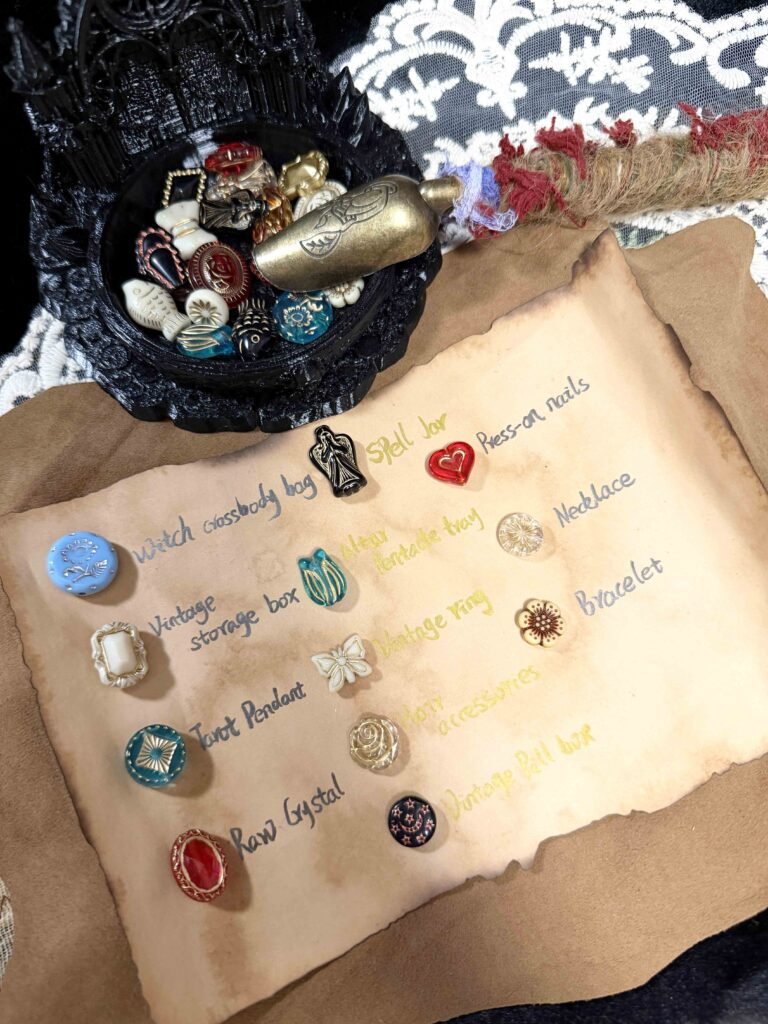 A parchment prize map displaying gothic charms mapped to rewards including glass keepsake bottles, press-on nails, raw crystals, and vintage accessories alongside a brass scoop