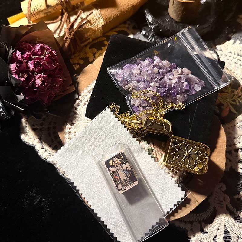 Close-up of the vintage gold filigree art card locket pendant