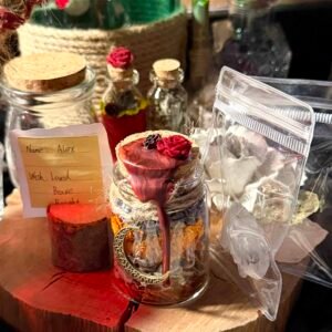 Aesthetic witchy herb jar with moon charm for meditation and altar decor.