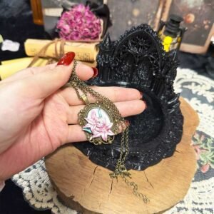 Vintage botanical lily necklace worn with layered outfits feminine gothic jewelry