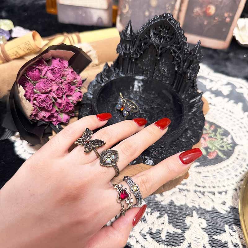 Antique bronze heart ring with red glass gem from the vintage ring set of 5