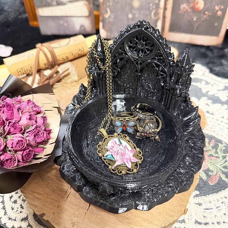 Gothic cathedral arch resin trinket dish holding rings and earrings on vanity